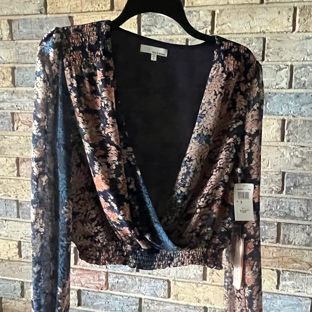 Size S multi colored floral blouse.